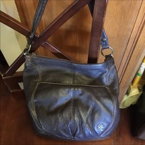 Women’s brown leather handbag by the Sak company